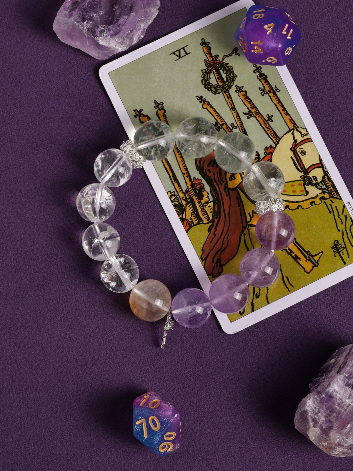 Amethyst and clear crystal bead bracelet with gold accent and silver cross charm