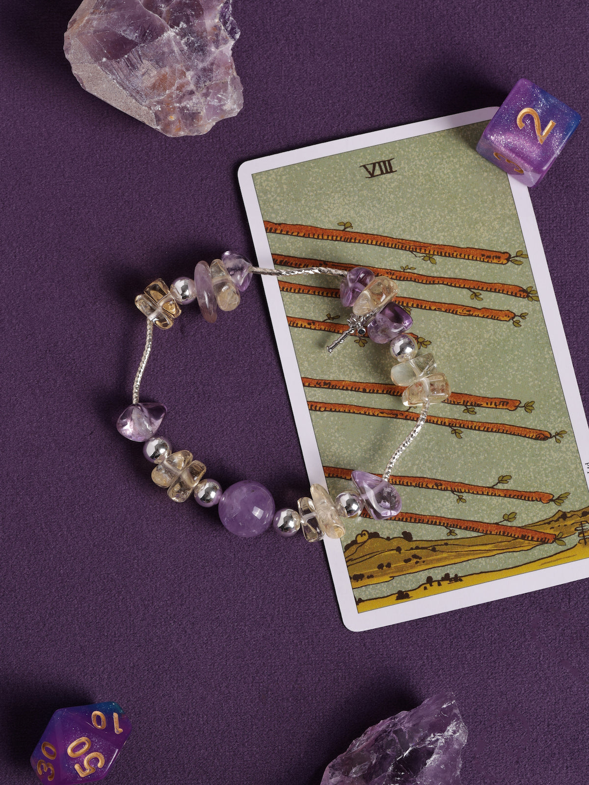 Beaded bracelet with lavender stones, clear beads, and silver-tone chain links
