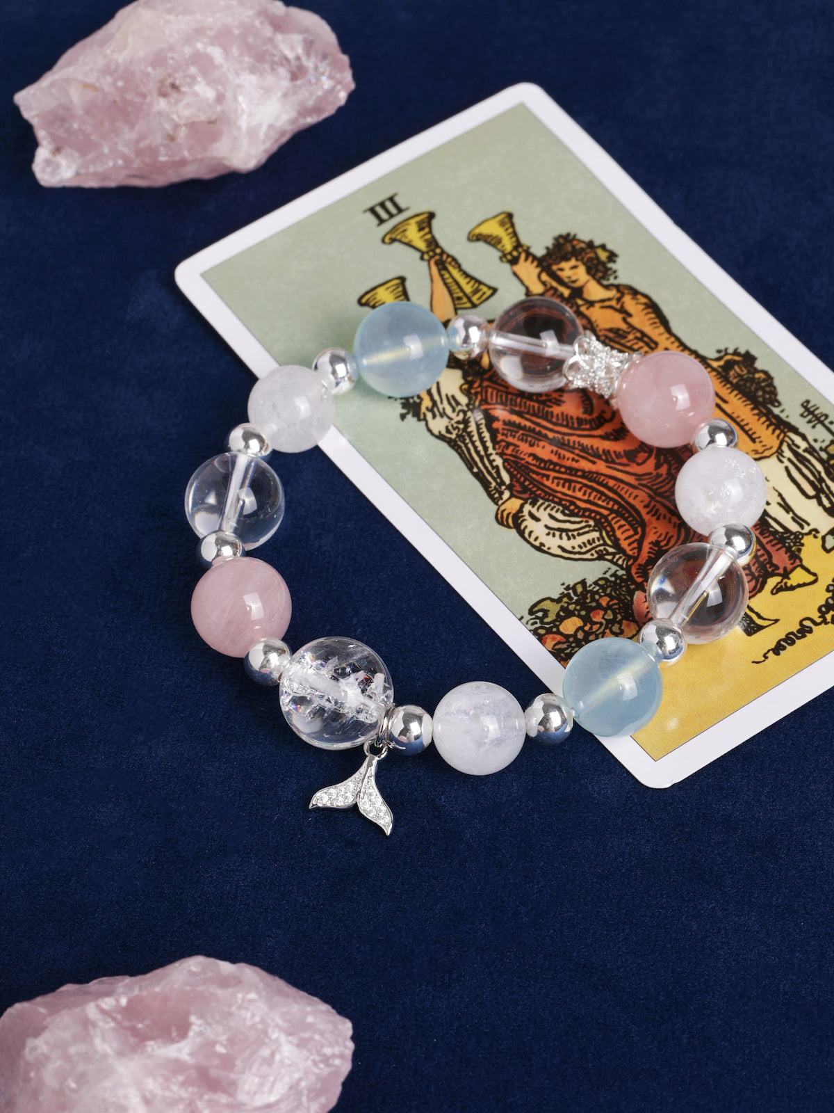 Crystal charm bracelet with pink, pale blue, and clear beads plus starfish charm