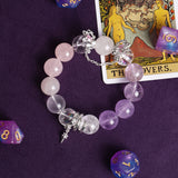 Rose, clear, and lilac beaded bracelet with silver-tone star charm and dangling accents