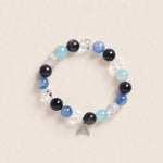 Blue and black bead bracelet with clear spacers and star charm