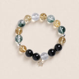 Beaded gemstone bracelet with star charm; clear, yellow, green, and dark black beads