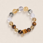 Beaded energy bracelet with gray, clear, honey and tiger-eye beads, star charm