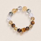 Beaded energy bracelet with gray, clear, honey and tiger-eye beads, star charm
