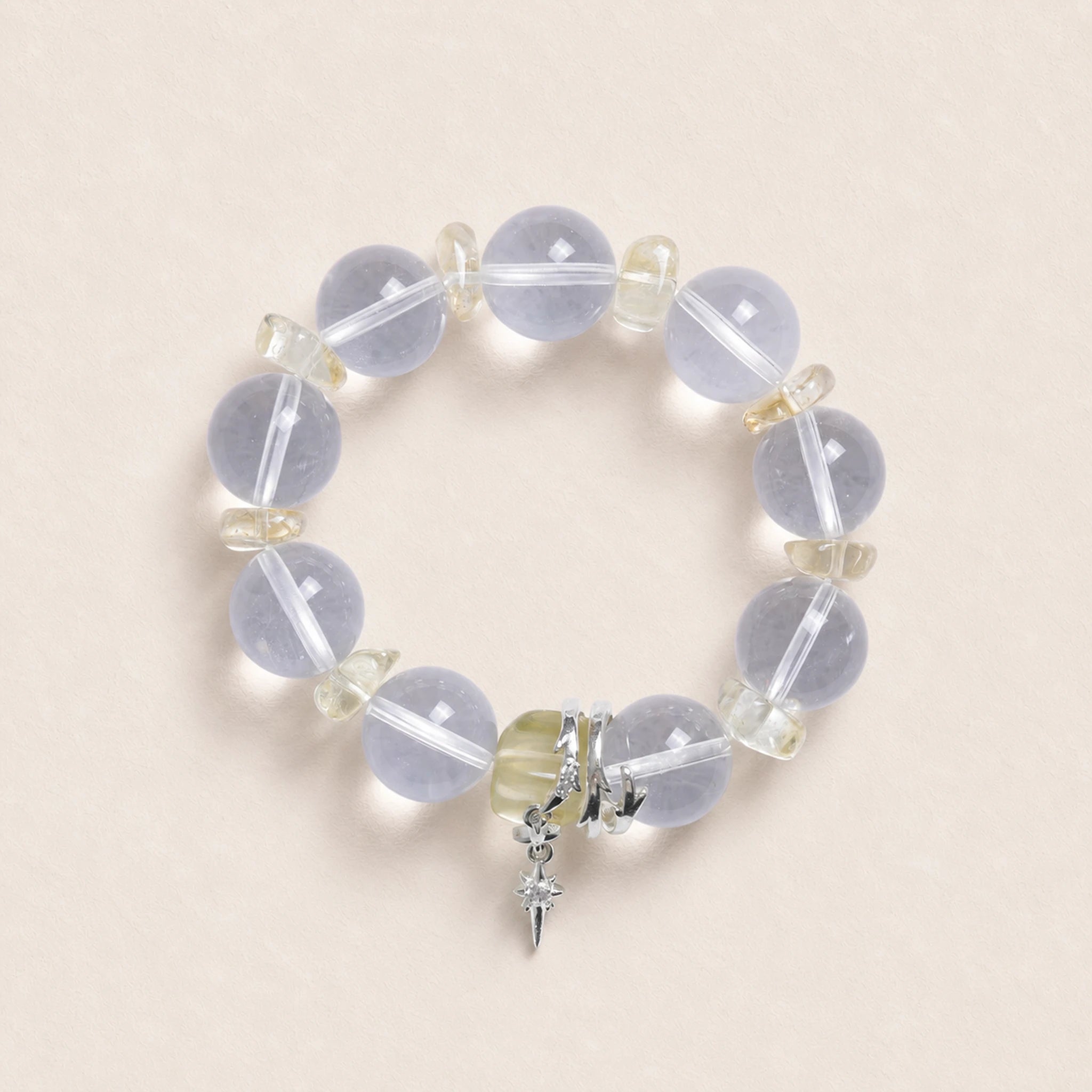 Light purple stone beaded bracelet with silver cross charm