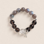 Gemstone energy bracelet with gray-blue beads, smoky beads, crystal charm & star pendant