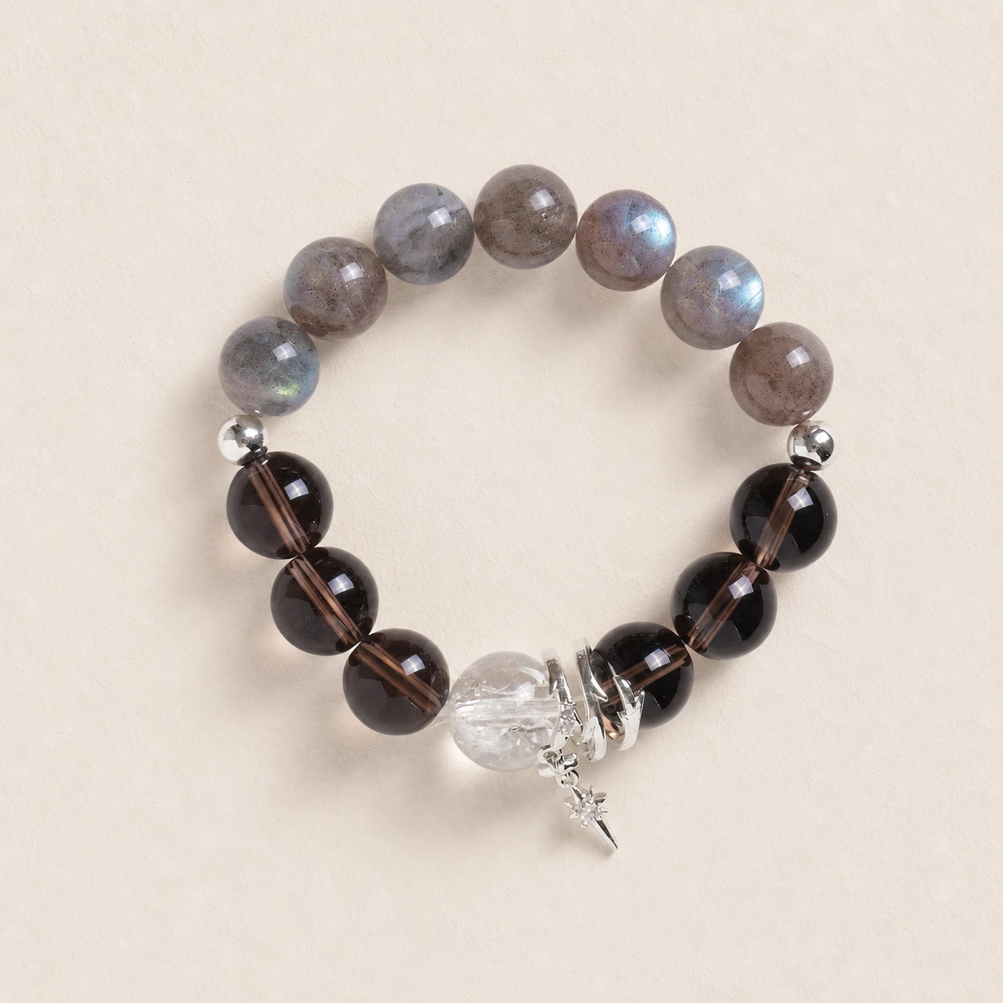 Gemstone energy bracelet with gray-blue beads, smoky beads, crystal charm & star pendant